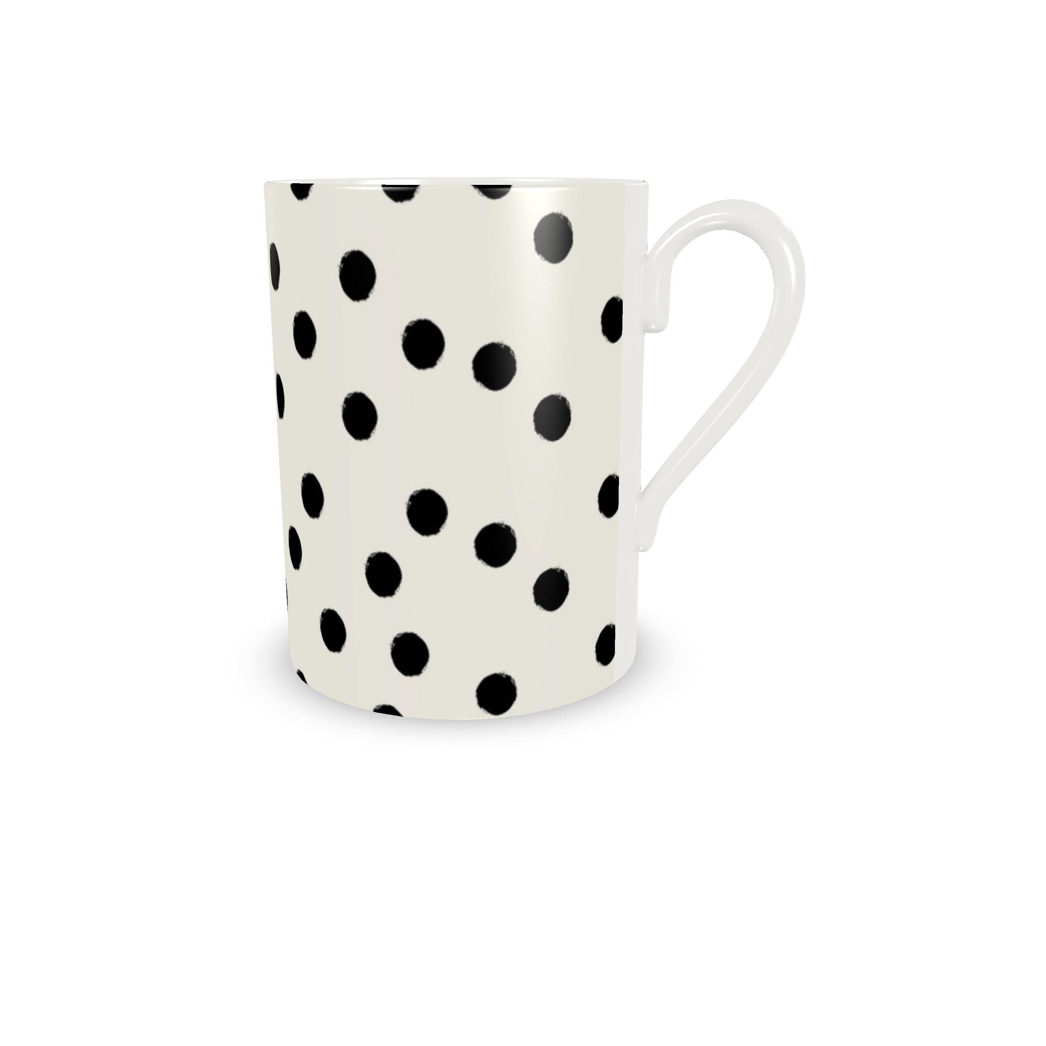 A white ceramic mug with a black polka dot pattern and a white handle, shown on a clean white background.