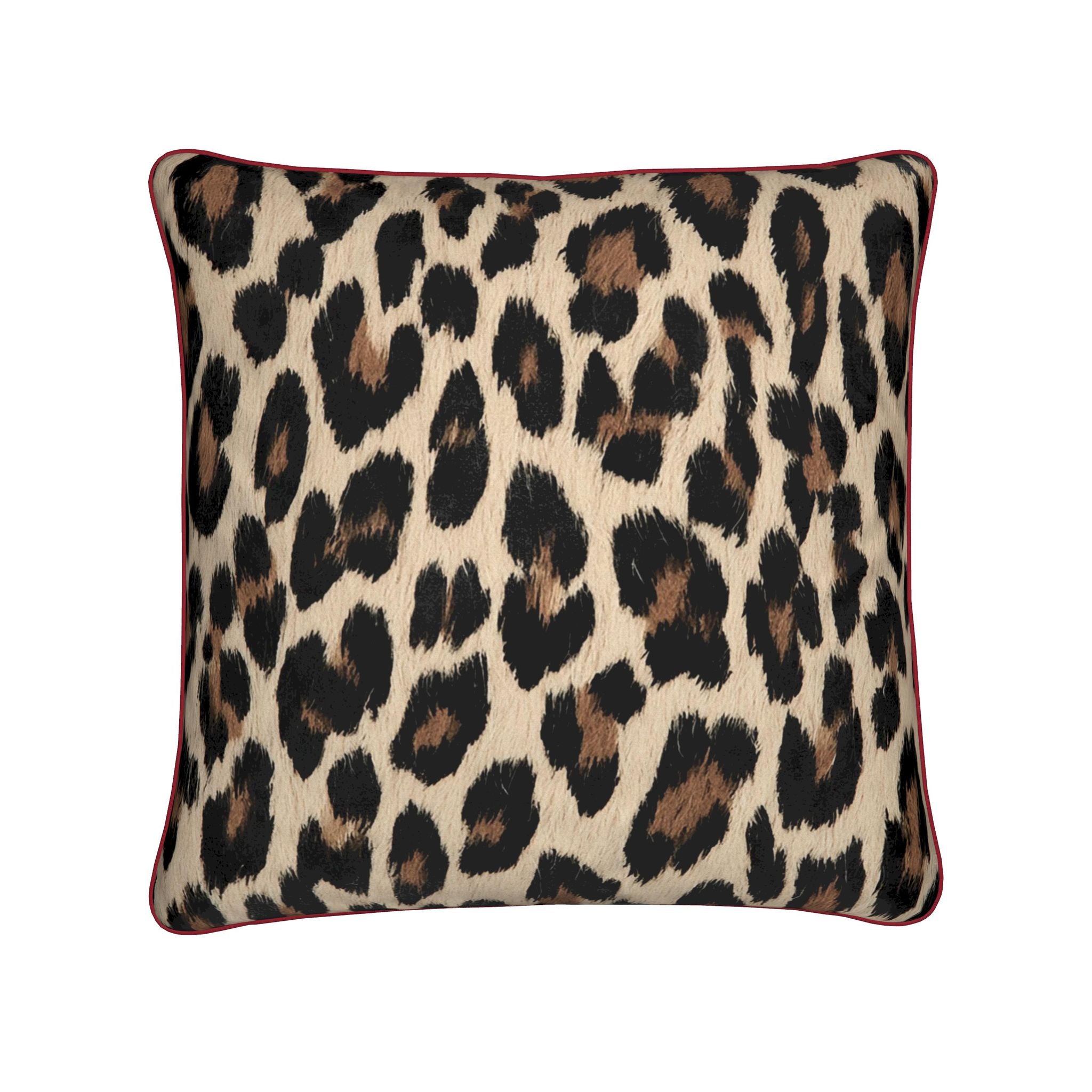 A square throw pillow featuring a classic leopard print pattern in black, brown, and beige, finished with a contrasting dark red piped border, shown against a plain white background.