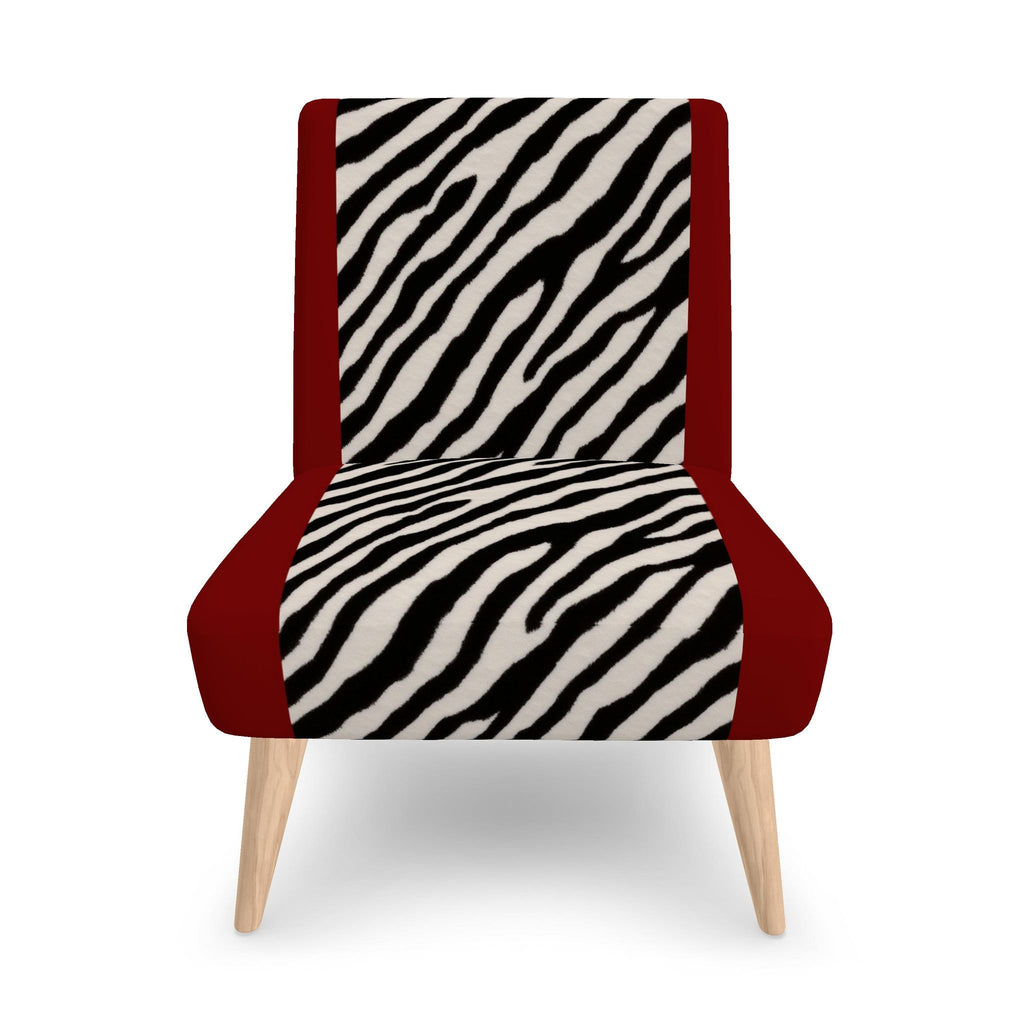 A modern accent chair with a zebra-print patterned seat and backrest, deep red side panels, and light natural wood legs, shown against a plain white background.