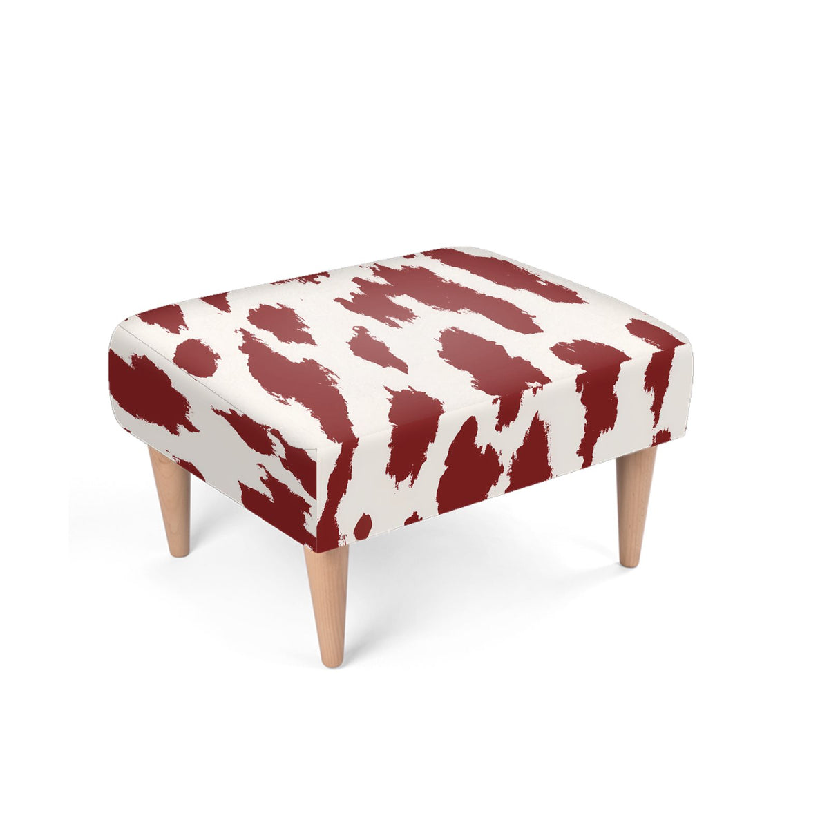 A square upholstered ottoman with a bold red and off-white abstract animal-print pattern and four tapered light wood legs, shown on a plain white background.
